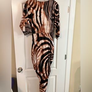 Black and brown zebra print dress. Perfect for girls night or sexy date night.